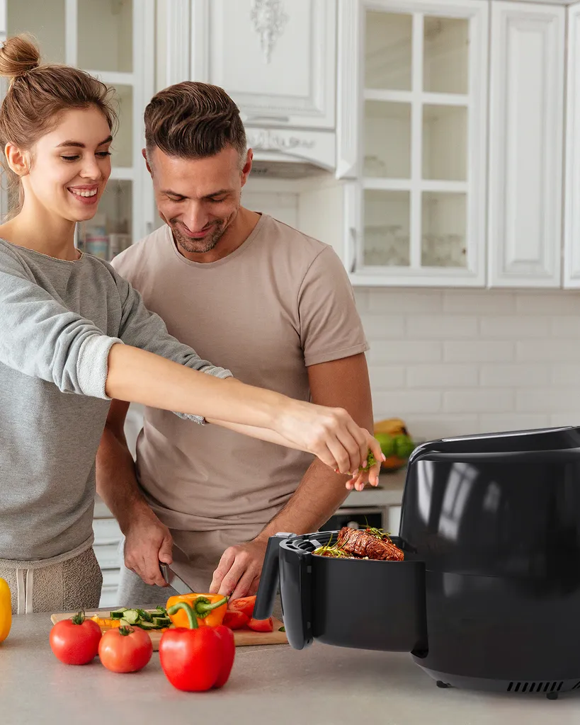 Tomons Heißluftfritteuse XXL 5,5 L Elektrofritteuse, 1800W, Airfryer Ohne Fett Und Öl, Friteuse Heißluft Mit 8 Voreinstellungen, Alarmtimer, Digitales Touch-Display, Frittierkorb Und Rezeptheft – Bild 9